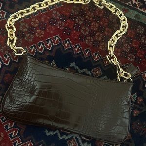 Golden chain strap animal embossed shoulder bag